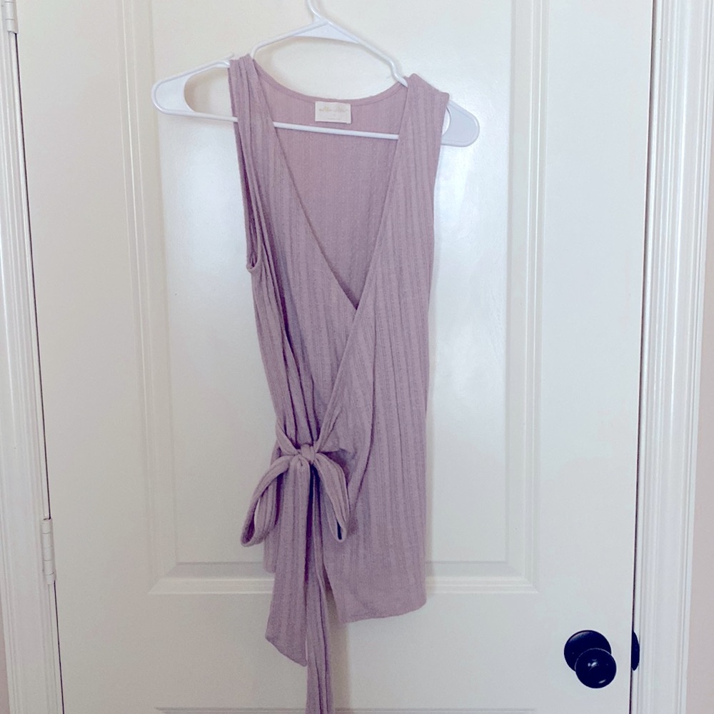 Wrap around tank top with tie detail.